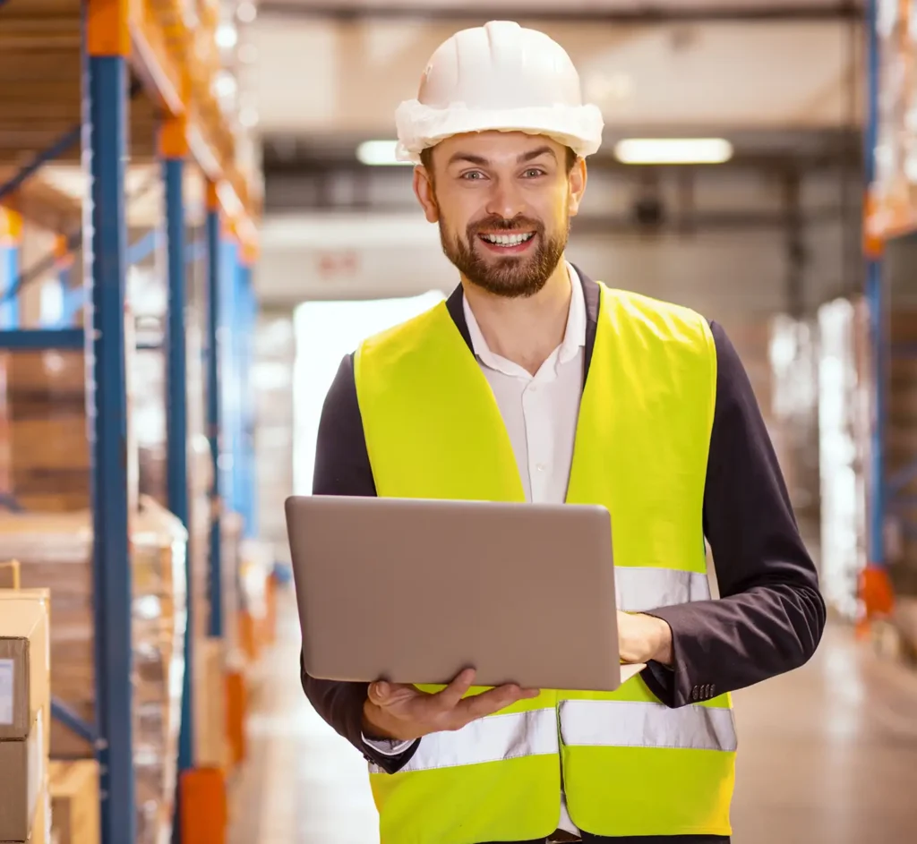 Professional logistics manager. Cheerful nice man smiling